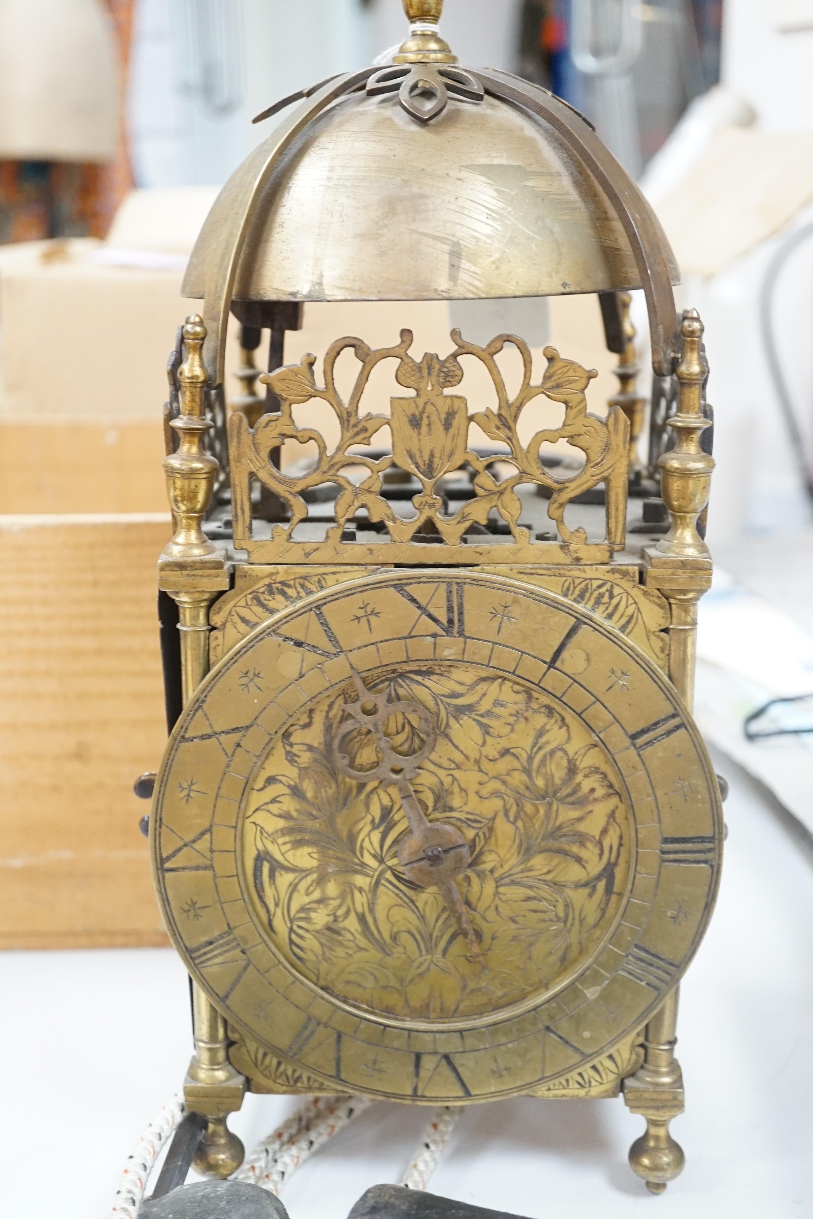 An 18th century and later brass lantern clock, 39cm